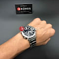 Боковая сторона корпуса Casio Casio G-Shock GST-B200D-1A с заводной головкой и логотипом бренда